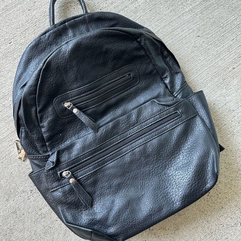 Black Backpack with Gold Details